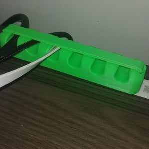 Kabelhållare med snäpplås
