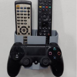 Väggmonterad hållare för fjärrkontroller och PS4-kontroll