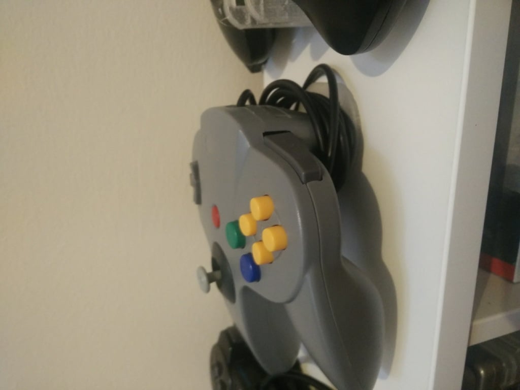 Samlingshållare för videospelskontroller: NES, SNES, Megadrive, PS2, N64, Xbox 360, Wii, PlayStation Move
