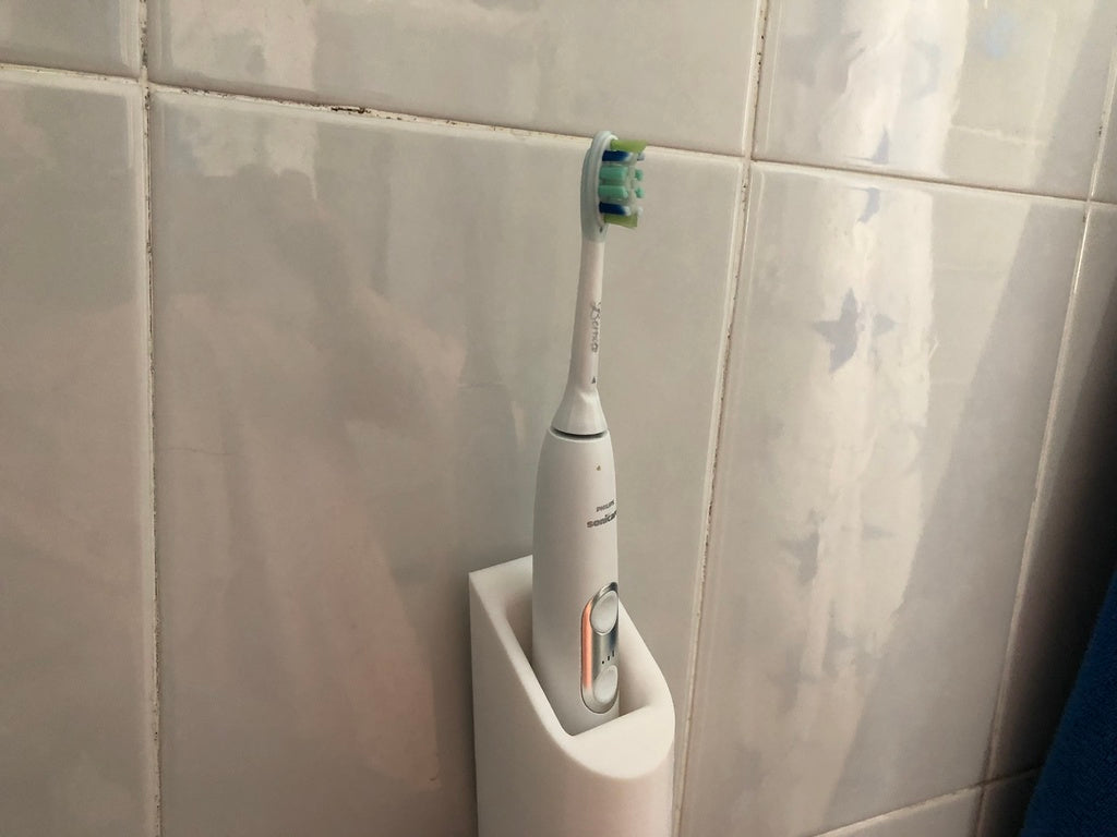 Philips Sonicare tandborsthållare med väggfäste och laddare