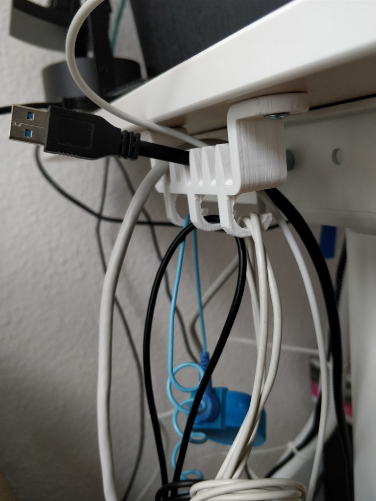 Kabelhållare för under bordet