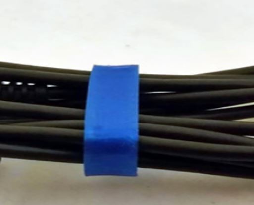 Kabelorganisator i två storlekar för USB och strömkablar