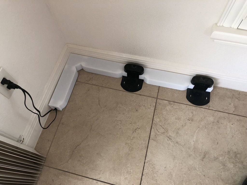 Roomba dockningsstation och kabelhanteringssystem