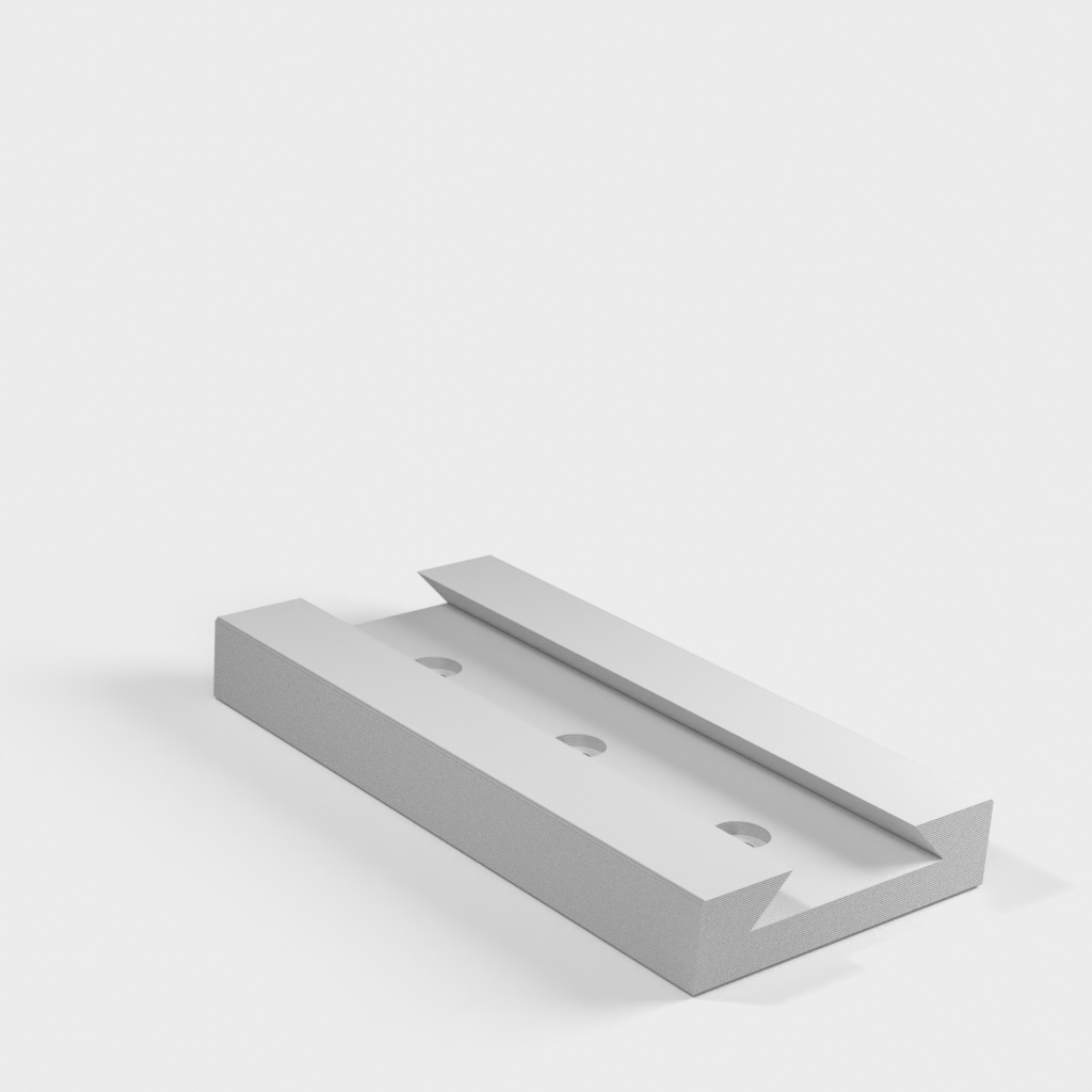 Väggmonterbar kabelhållare för USB-förlängningssladdar