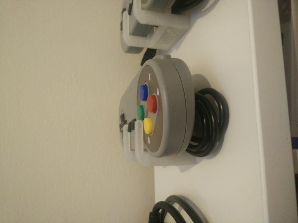 Samlingshållare för videospelskontroller: NES, SNES, Megadrive, PS2, N64, Xbox 360, Wii, PlayStation Move