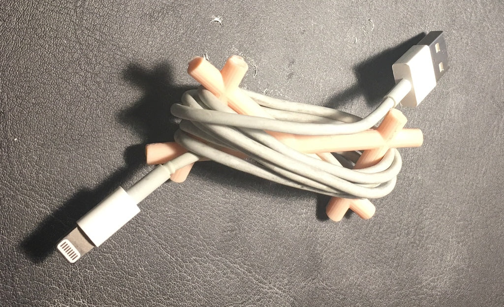 Abstrakt sladdhållare