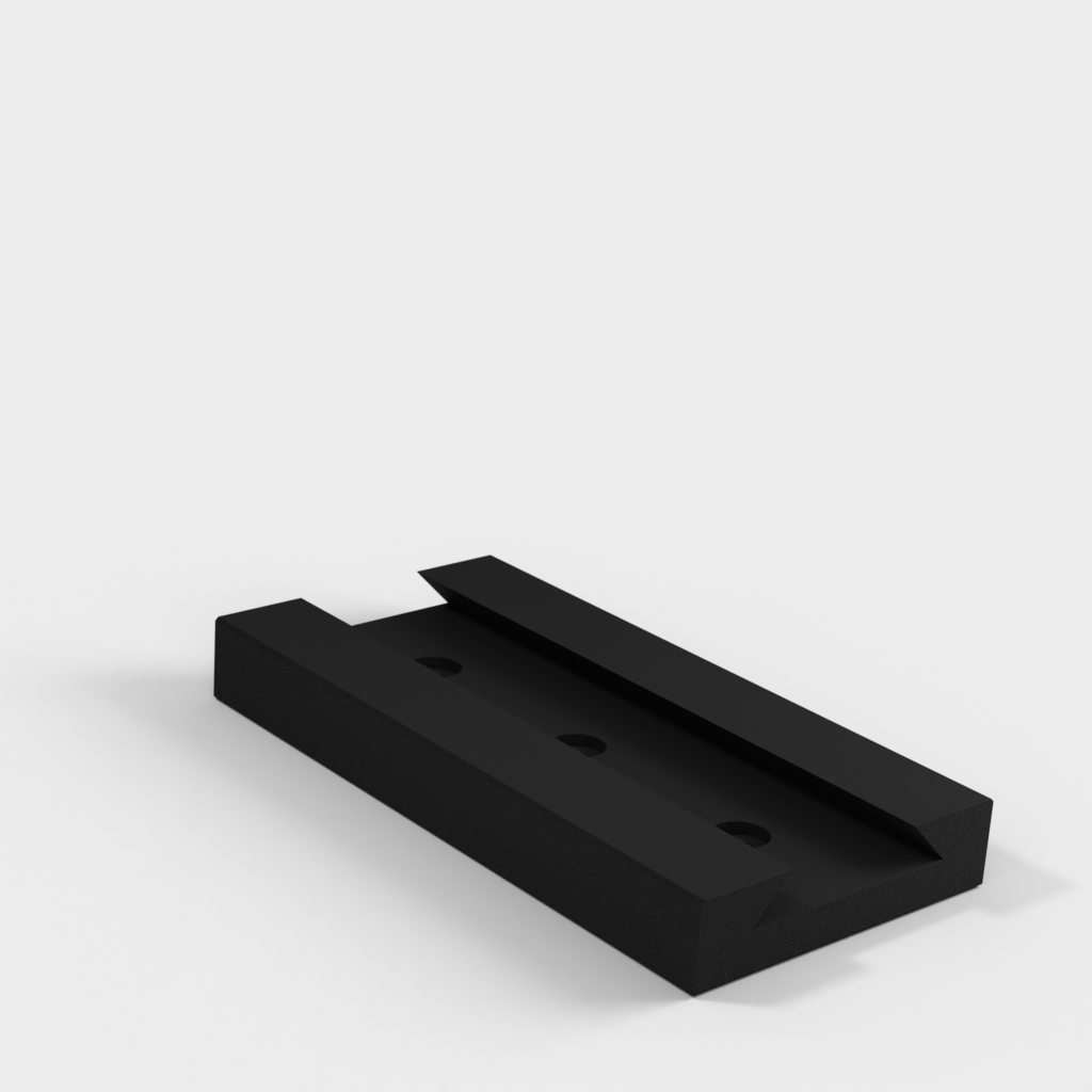 Väggmonterbar kabelhållare för USB-förlängningssladdar
