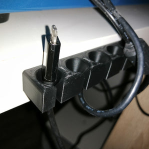 USB-kabelhållare för att organisera kablar