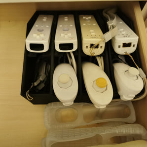 Wii-fjärrkontrollhållare - Organisera dina handkontroller