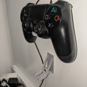 Elegant väggfäste för PS4-kontroll