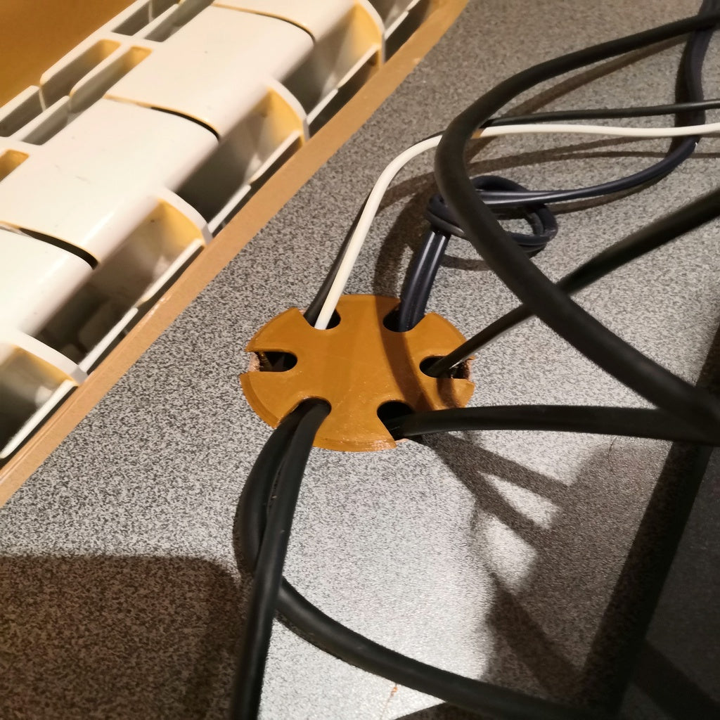 Kabelhålsfördelare för skrivbord