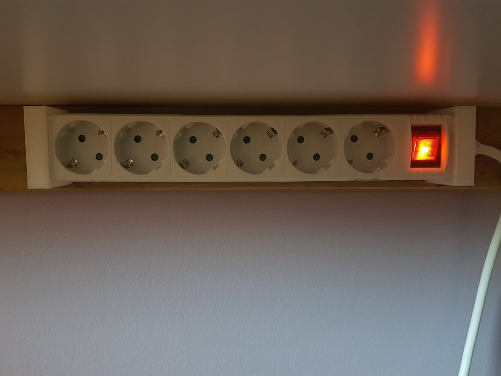 Flervägs kabelhållare för elkablar
