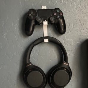 Väggfäste för PS4-kontroll och hörlurar