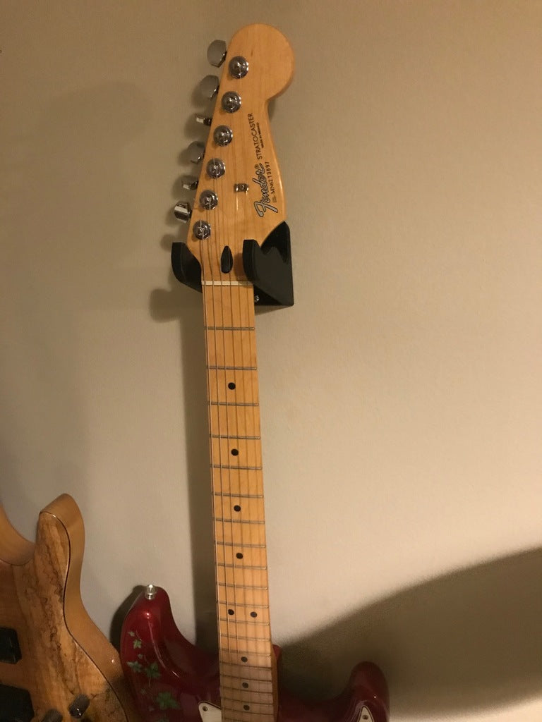 Kraftigt väggfäste för gitarr och bas