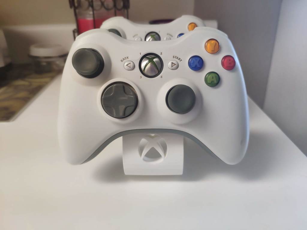 Dubbla Xbox 360-kontrollstativ med logotyp