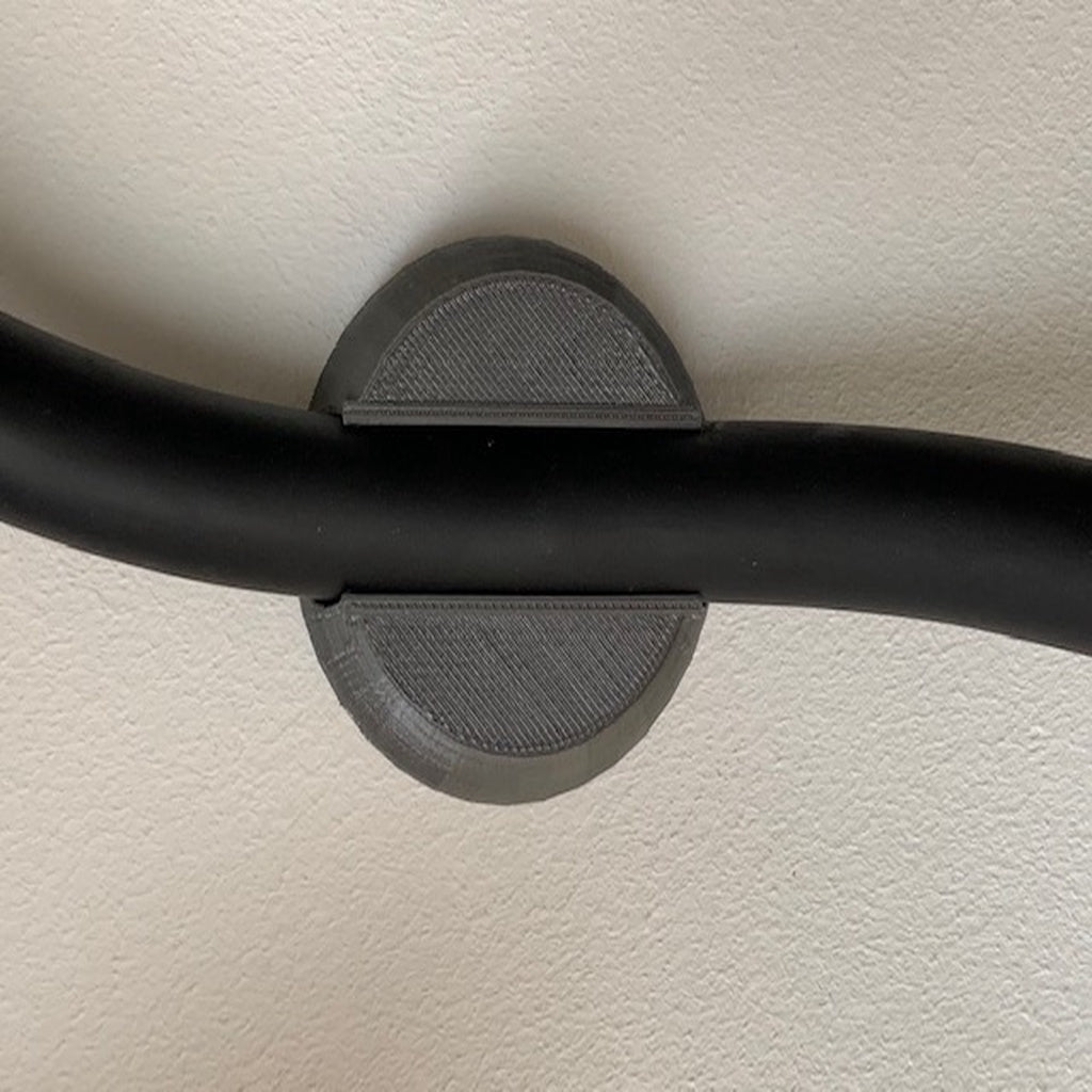 Väggmonterad klickhållare för 19 mm kabel för elbilsladdare