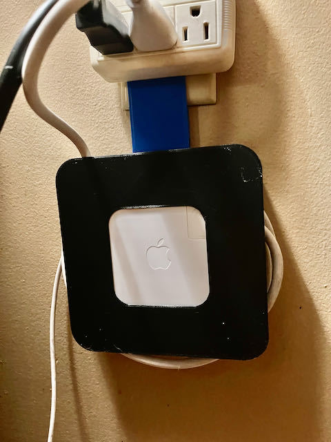 MacBook Pro laddare kabelorganiserare och uttagshängare