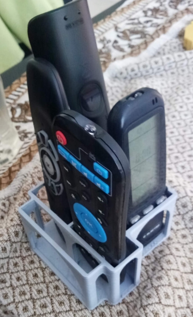 Fjärrkontrollhållarbox med smartphoneställ
