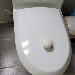 Runt handtag för toalettlock