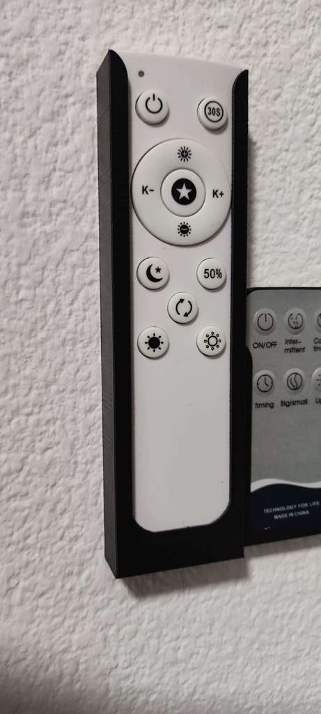 Lätt fjärrkontrollhållare med dubbelhäftande tejp för montering