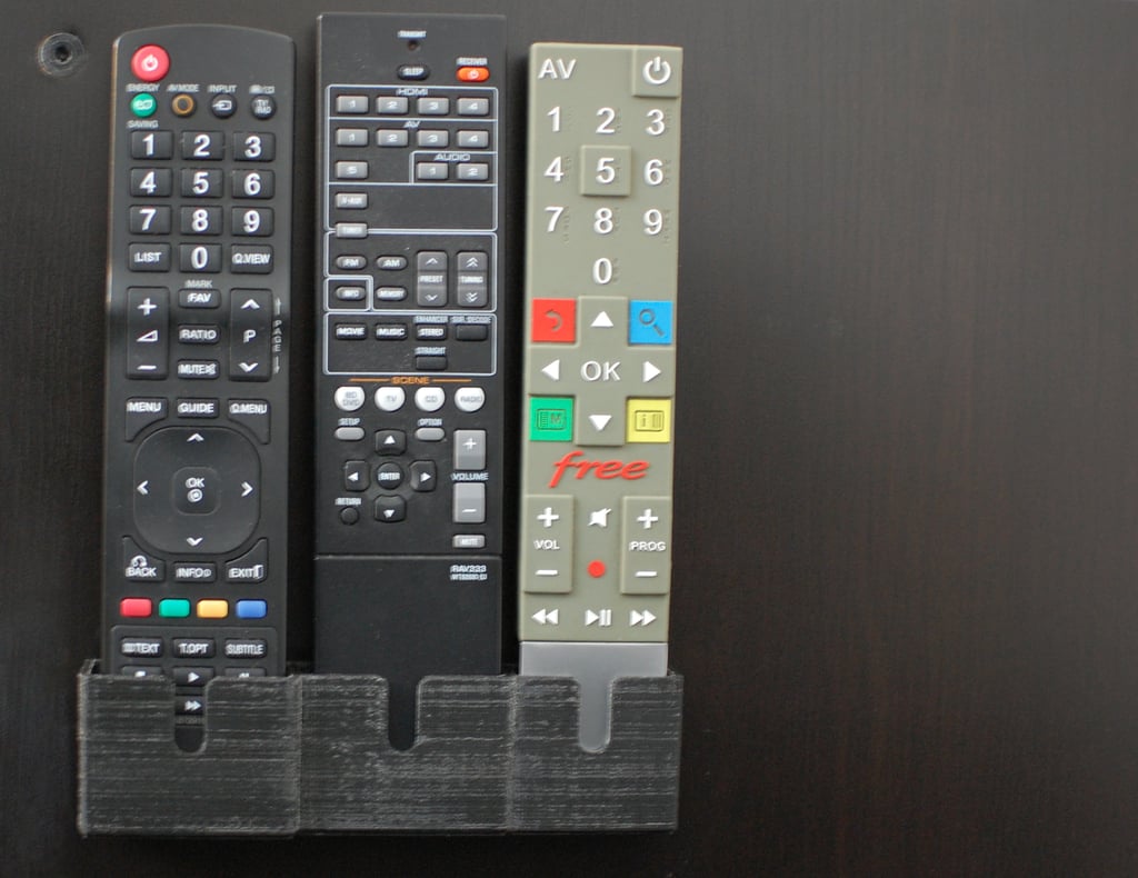 Fjärrkontrollhållare för Freebox Revolution, LG 42LD420 och Yamaha RX-V367