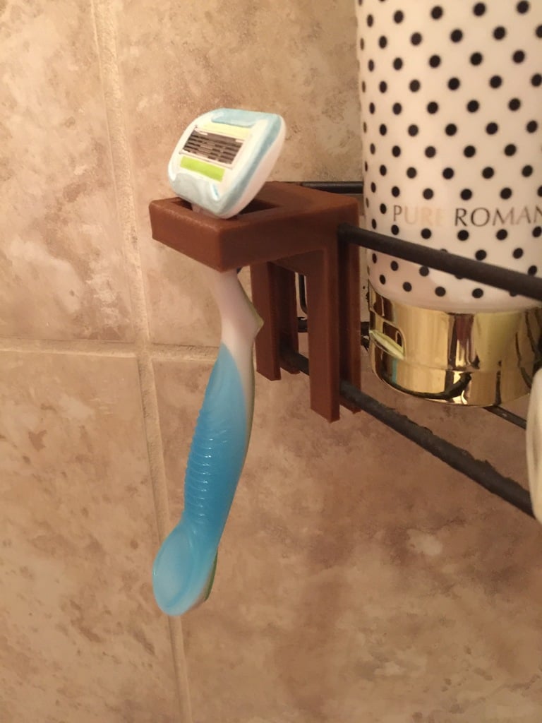 Rakhyvelhållare för duscharrangören