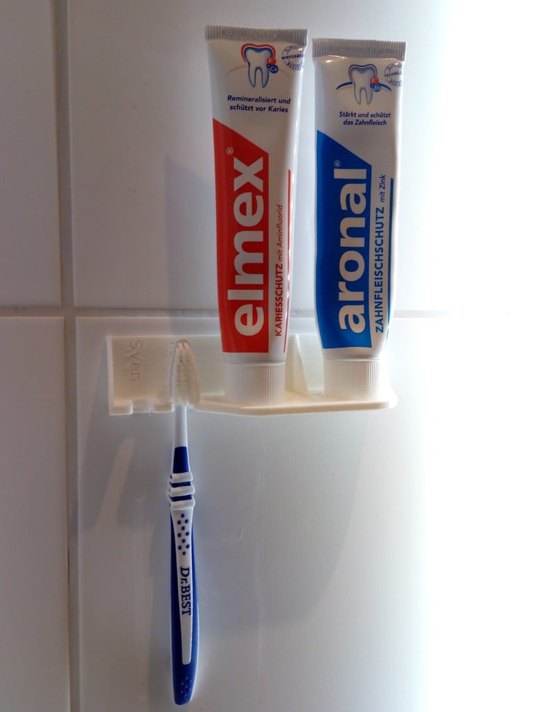 Skruvlös tandborsthållare för olika borsttyper