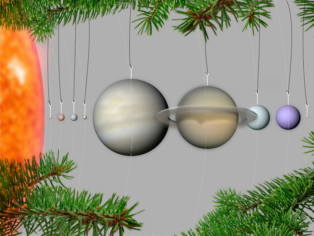 Skalamodeller av vårt planetsystem som julgransprydnader