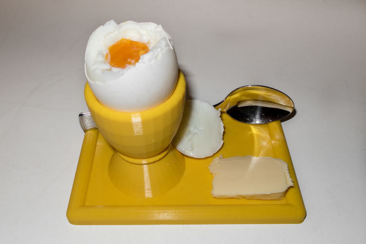 Äggkopp med tallrik och skedhållare