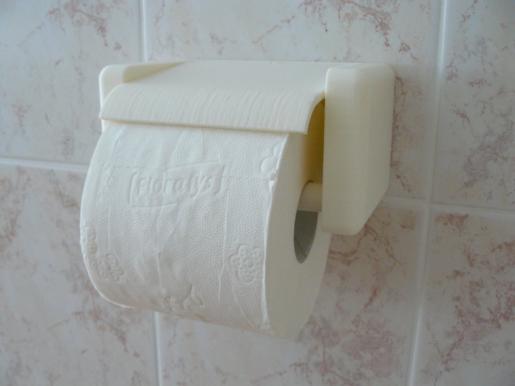 Snabbbyte av toalettpappershållare