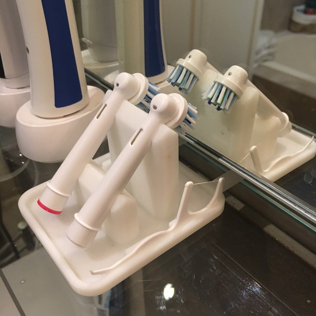 Oral-B tandborstställ med tandtrådshållare och plats för spegelhylla