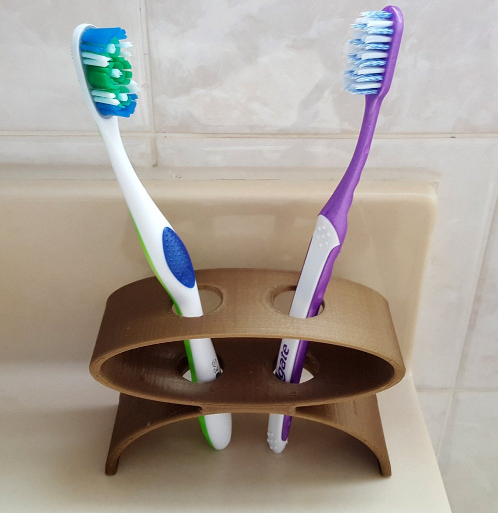 Dubbel tandborsthållare