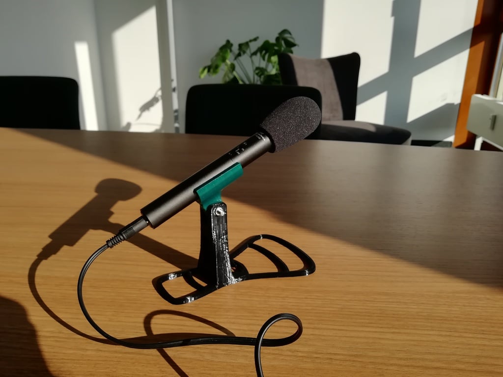 Justerbar mikrofonhållare för handhållen mikrofon