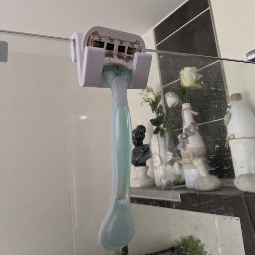 Väggmonterad rakbladshållare för hona för dusch
